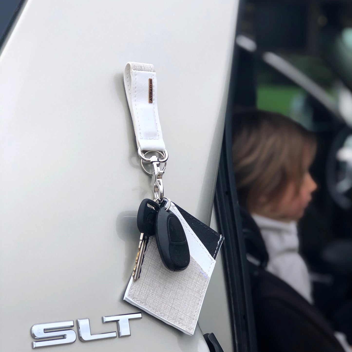 A magnetic gray vegan leather Keychain Bracelet.
